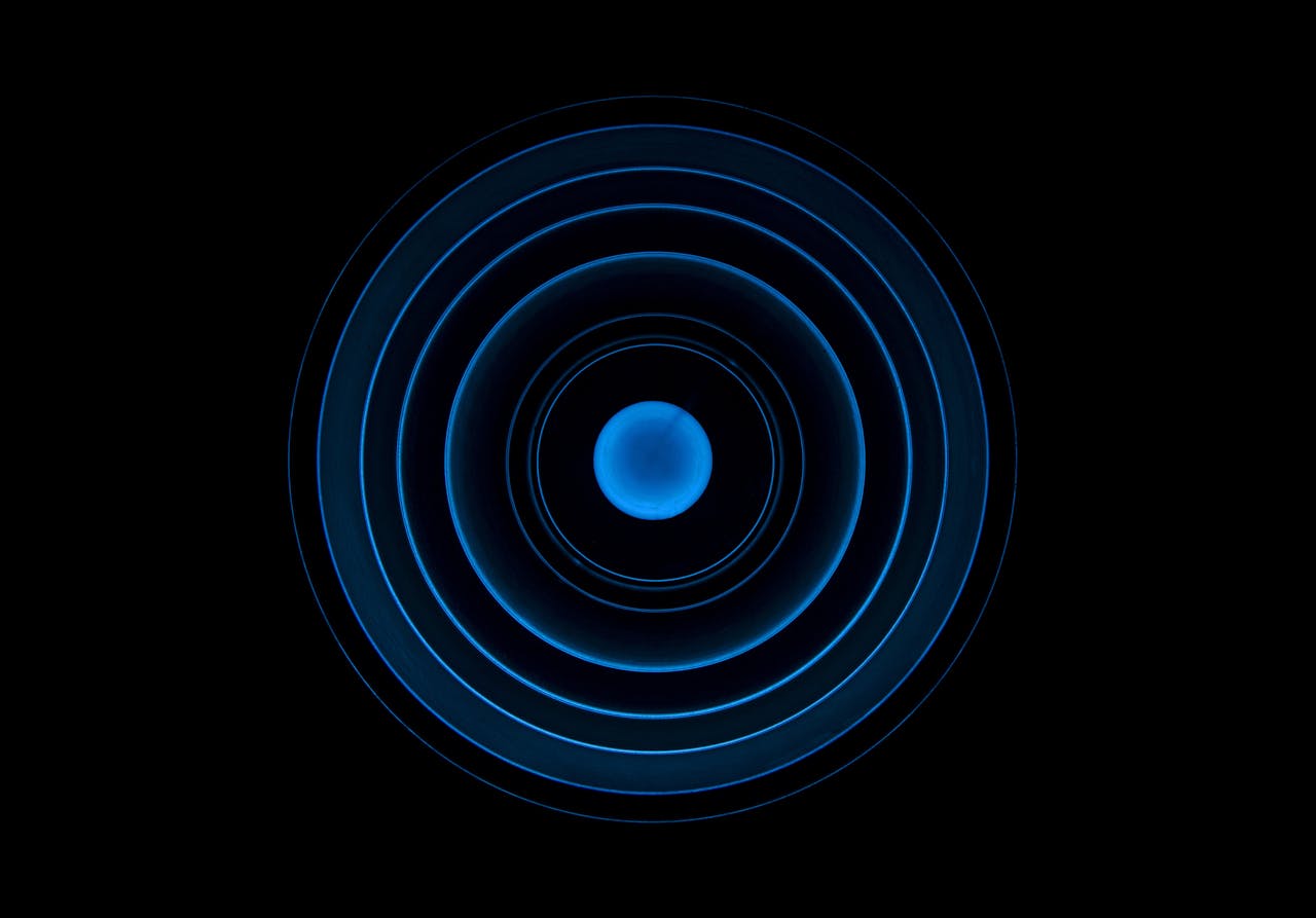Low Angle View of Spiral Staircase Against Black Background